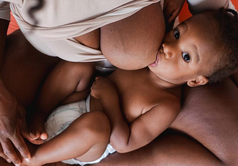 Breastfeeding with Big Boobs: Concerns, Holds, and Tips