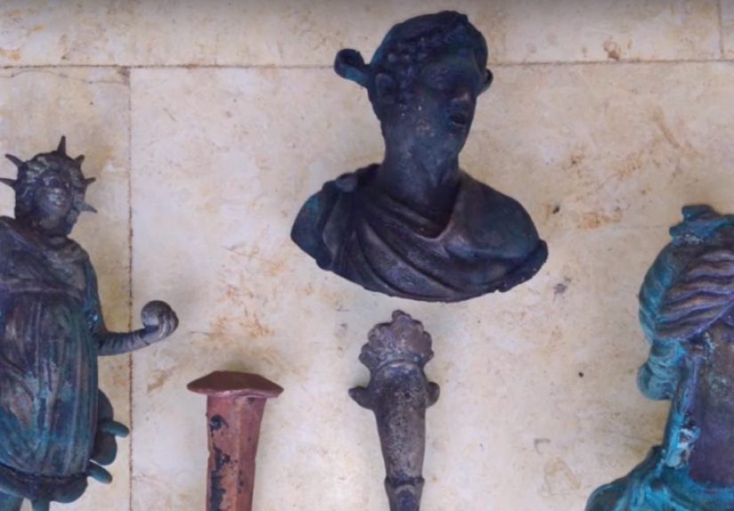 Ancient Roman Shipwreck Full of Coins and Bronze Statues Discovered Off Israel
